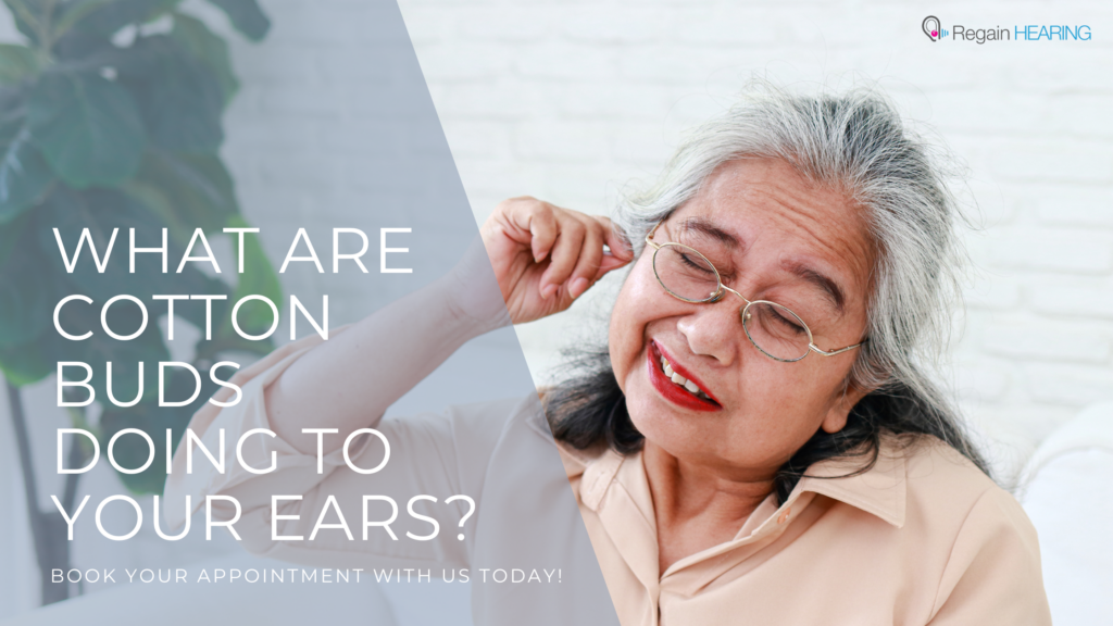 What are cotton buds doing to your ears? - lady struggling with cotton bud in ear with discomfort